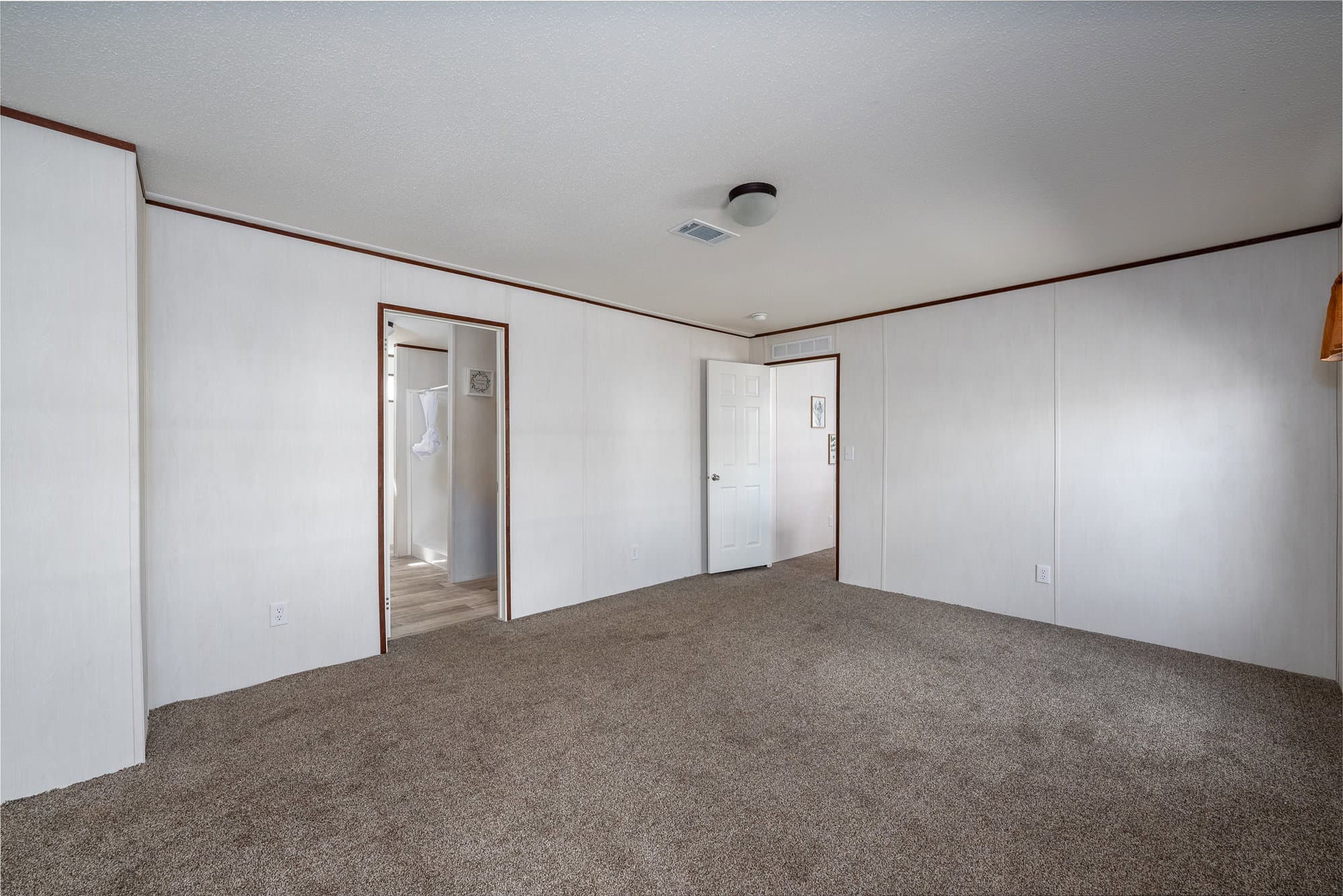 The curry bedroom home features